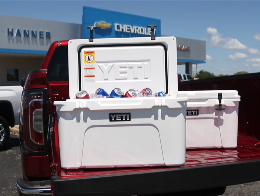 45 QT. YETI COOLER in a truck bed outside of Hanner GMC Trucks